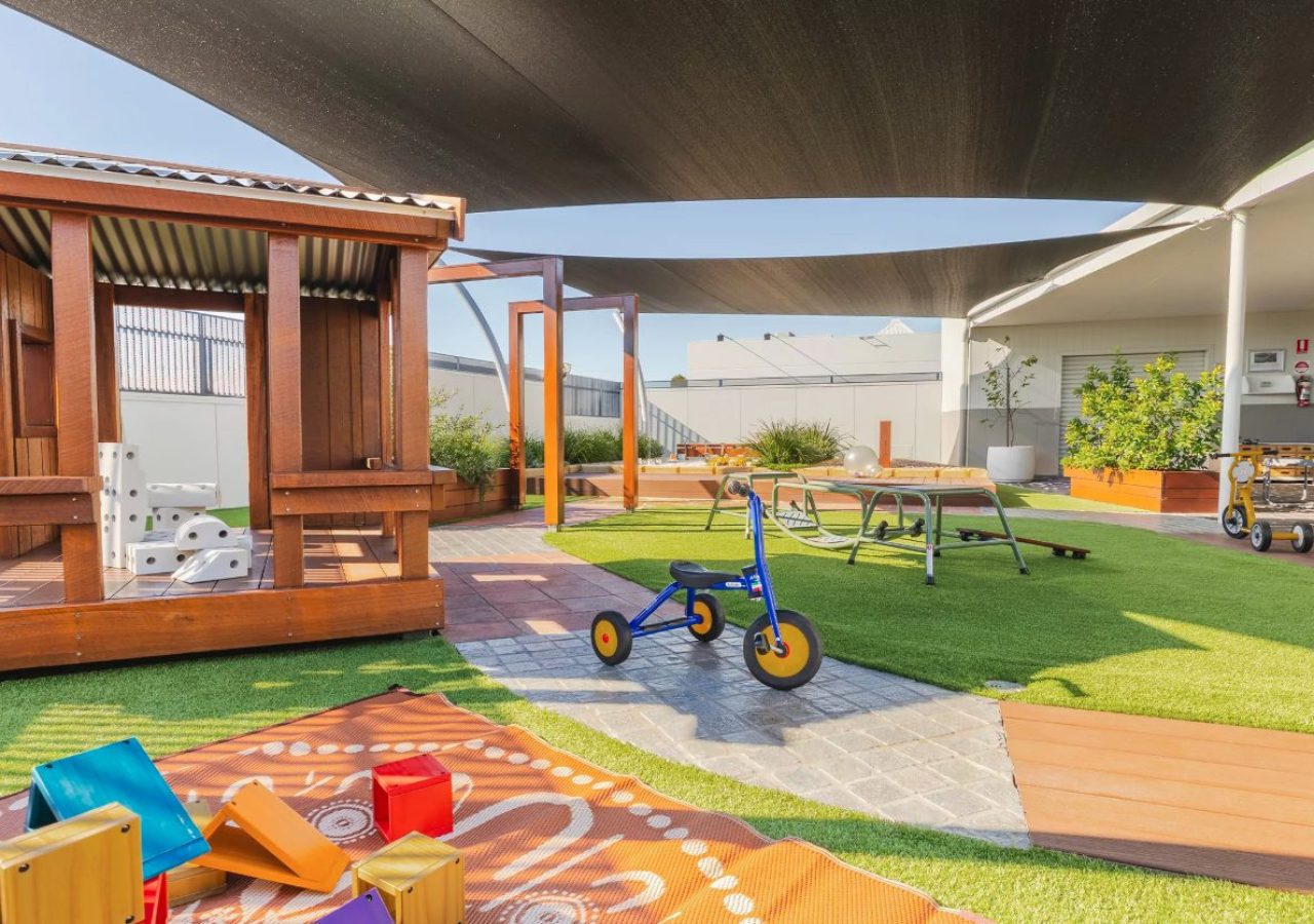 Kewdale Early Learning Centre landscaping - cubby house, bike track and outdoor play area