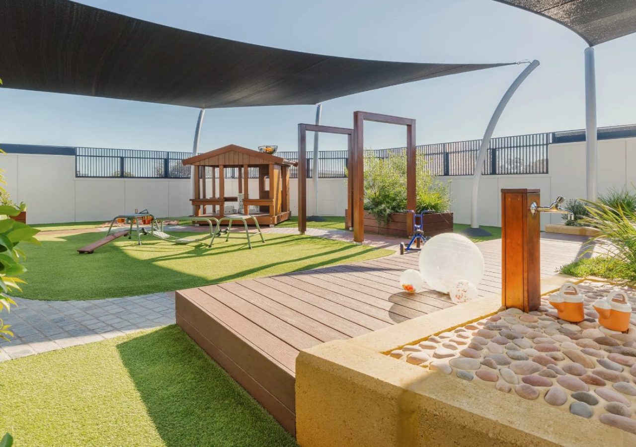 Kewdale Early Learning Centre landscaping - timber deck, sandpit and nature play area