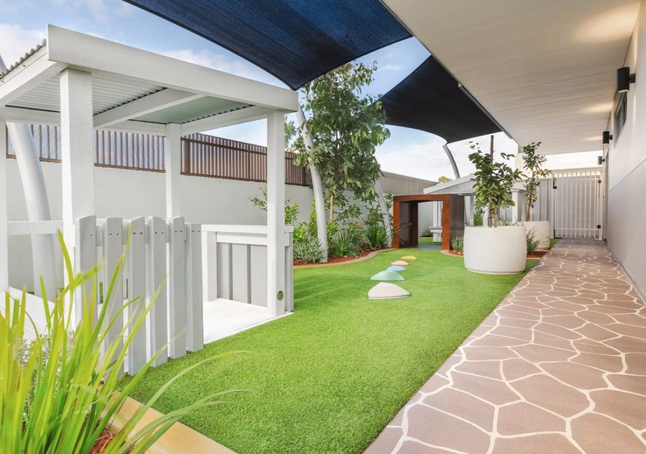 Kewdale Early Learning Centre landscaping - covered walkway with crazy paving and artificial turf
